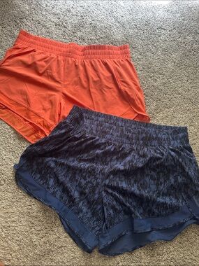 2 pair Athleta Size Medium Mesh Racer 4” Run shorts